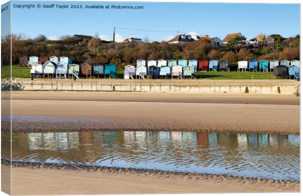 Colourful beach huts at Frinton on Sea Canvas Print by Geoff Taylor