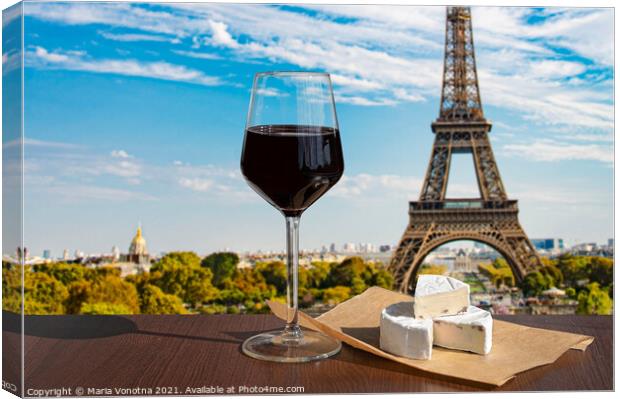 Glass of wine with brie cheese on Eiffel tower in Paris Canvas Print by Maria Vonotna