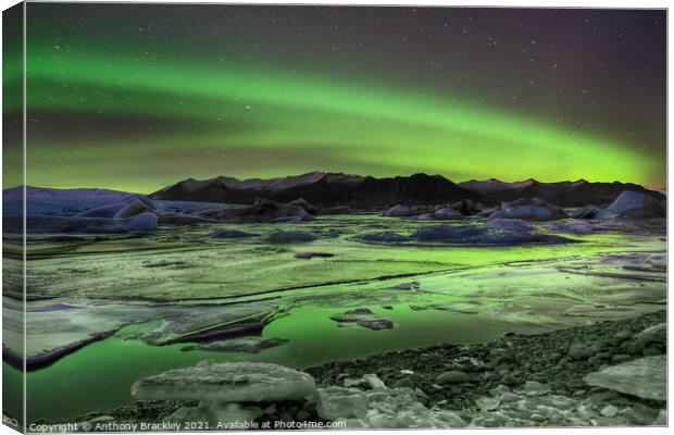 Lake ice aurora Canvas Print by Tony Prower