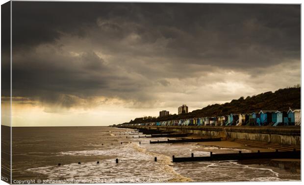 Late afternoon at Frinton on Sea Beach huts Canvas Print by johnseanphotography 
