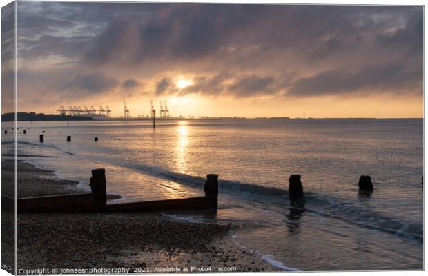 Harwich Docks at sunrise from Dovercourt Beach       1323 Canvas Print by johnseanphotography 