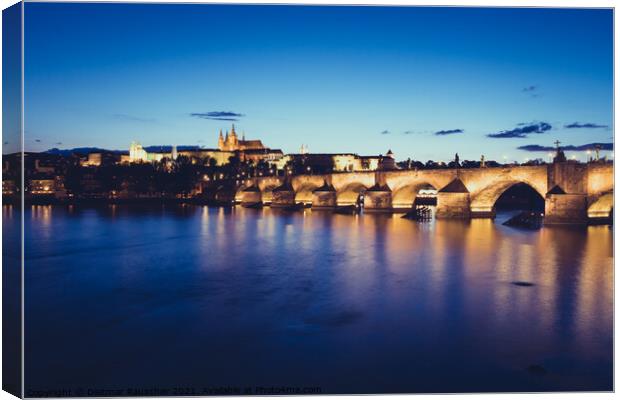 Charles Bridge over River Vltava in Prague at Night  Canvas Print by Dietmar Rauscher