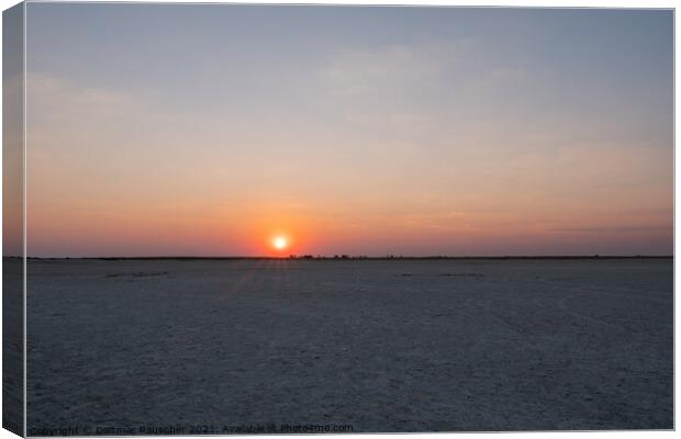 Sun Setting in Makgadikgadi Salt Pan - Empty Flat Plain and Hori Canvas Print by Dietmar Rauscher