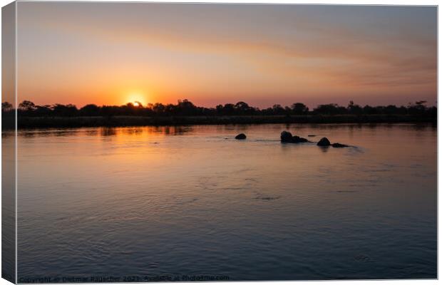 Sunset on the Okavango River, Namibia Canvas Print by Dietmar Rauscher