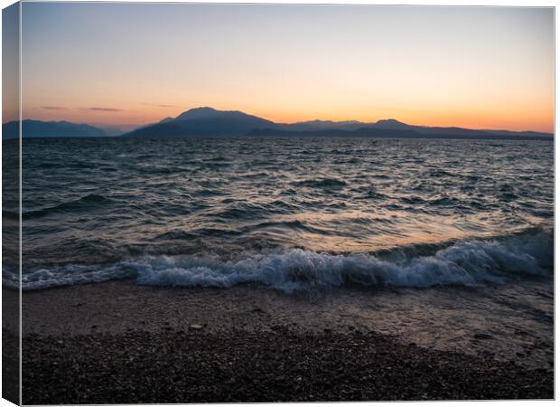 Lake Garda Sunrise in Sirmione, Italy Canvas Print by Dietmar Rauscher