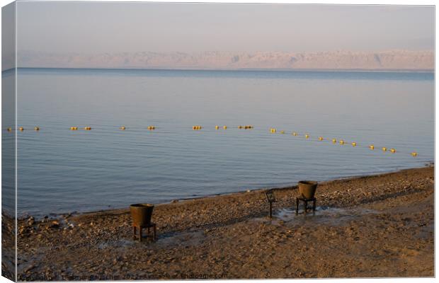 Dead Sea Beach with Mud Buckets in Jordan Canvas Print by Dietmar Rauscher