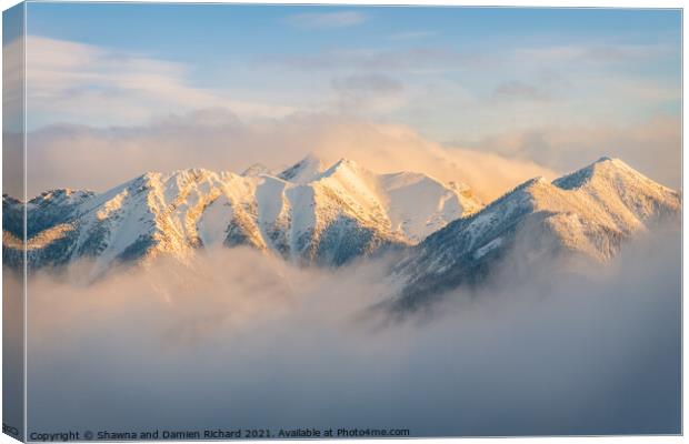 Winter Rocky Mountain Ridges Shrouded in Mist Canvas Print by Shawna and Damien Richard