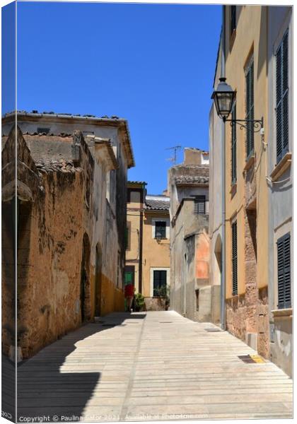 Alcudia Old Town medieval street. Majorca Canvas Print by Paulina Sator