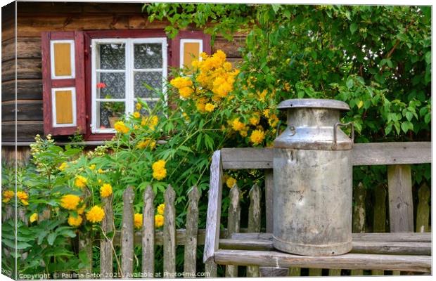 Steel milk can on the bench Canvas Print by Paulina Sator