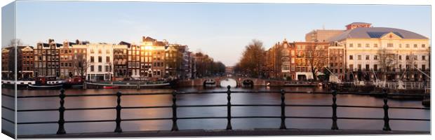 Amstel River and Architecture Amsterdam Netherlands Sunset Canvas Print by Sonny Ryse