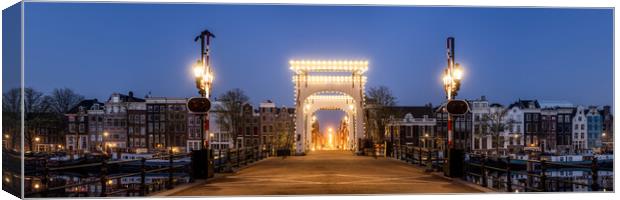 Magere Brug bridge at dusk Amstel River Amsterdam Netherlands Canvas Print by Sonny Ryse