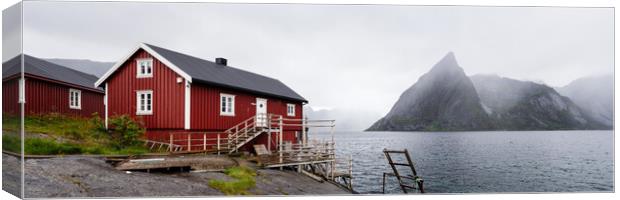 Red Rorbu Rorbuer Fishing cabin hut Reinefjorden Lofoten Islands Canvas Print by Sonny Ryse