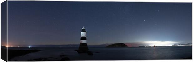 Penmon Lighthouse Anglesey Wales Stars at night Canvas Print by Sonny Ryse