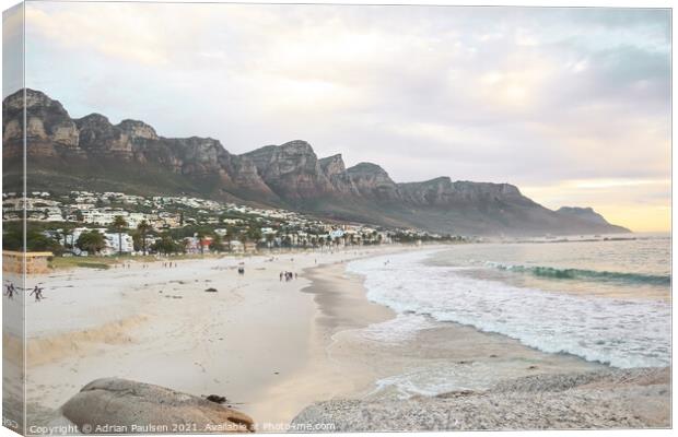 Sunset over Camps Bay beach  Canvas Print by Adrian Paulsen