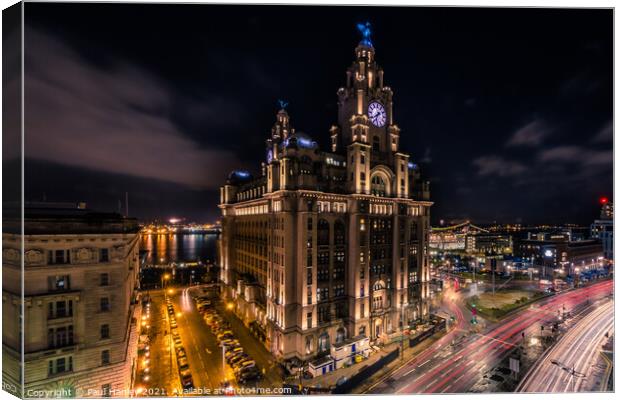 Dramatic shot of the Royal Liver Building and the Liverpool skyl Canvas Print by Paul Hanley