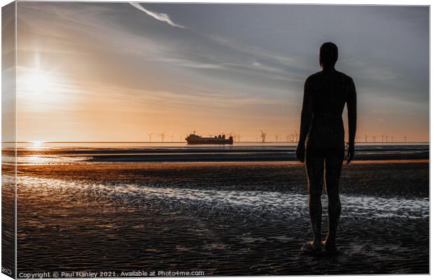 A lonely figure stands guard over the shipping Canvas Print by Paul Hanley
