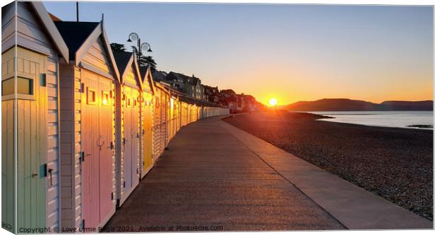 Beach huts at sunrise in Lyme Regis Canvas Print by Love Lyme Regis