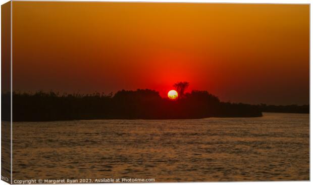 Okavango river sunset Canvas Print by Margaret Ryan