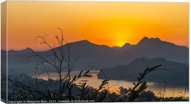 Sundown over the Mekong Canvas Print by Margaret Ryan