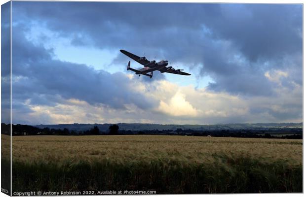 Lancaster returns from mission Canvas Print by Antony Robinson
