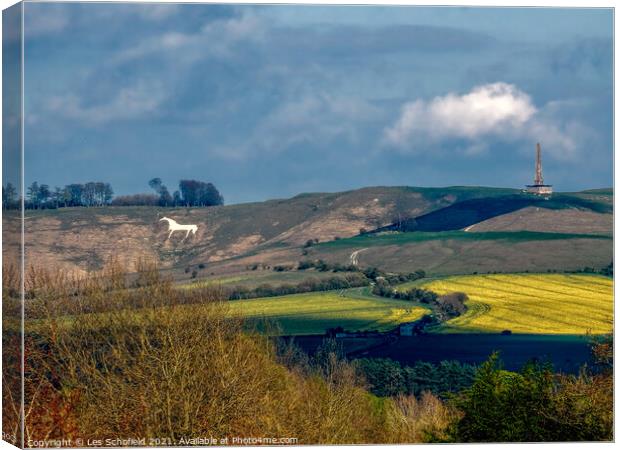 Majestic White Horse and Ancient Monument Canvas Print by Les Schofield