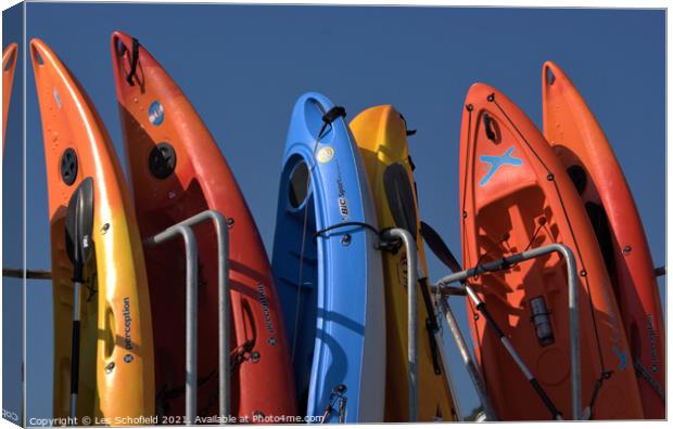 Kayaks  Canvas Print by Les Schofield
