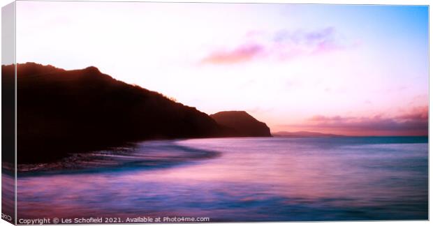Charmouth Sunrise  Canvas Print by Les Schofield