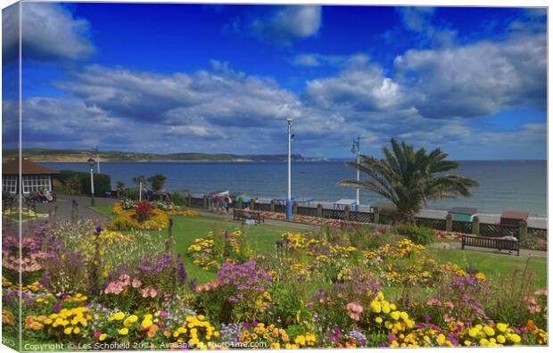 A Floral Haven Overlooking Weymouth Bay Canvas Print by Les Schofield