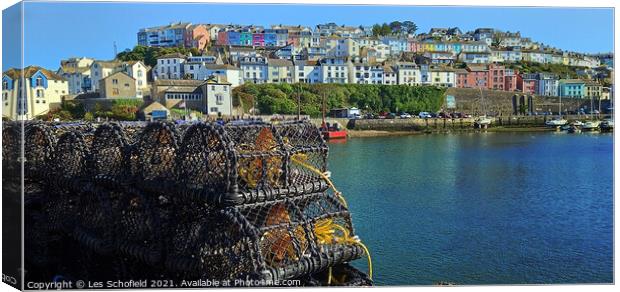 Brixham Harbour and crab pots Canvas Print by Les Schofield