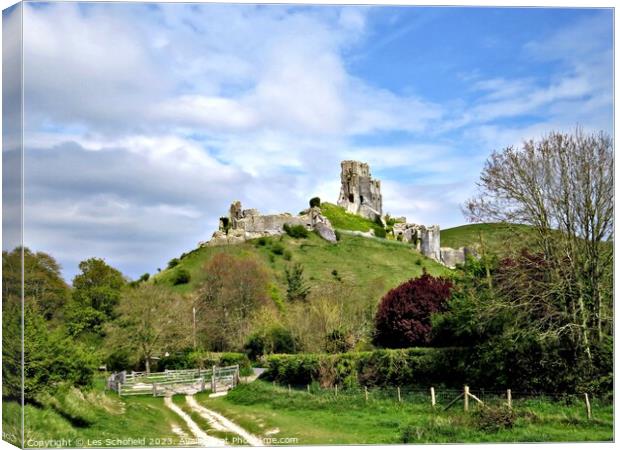 Majestic Ruins of Corfe Castle Canvas Print by Les Schofield