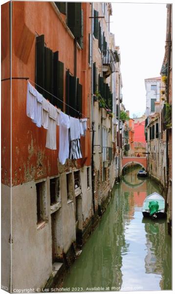 Washing day in Venice  Canvas Print by Les Schofield
