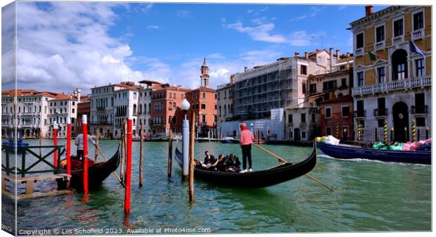 Serene and Romantic Venetian Gondola Ride Canvas Print by Les Schofield