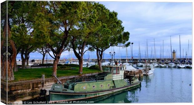 Serene Sunrise Over Lake Garda Canvas Print by Les Schofield