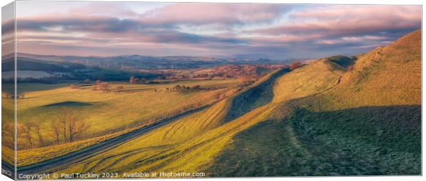 Morning Sun over Eggardon Hill Canvas Print by Paul Tuckley