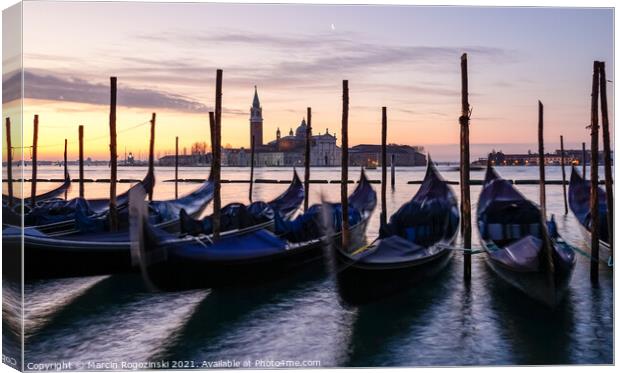 Venetian gondolas at sunrise in Venice Italy Canvas Print by Marcin Rogozinski