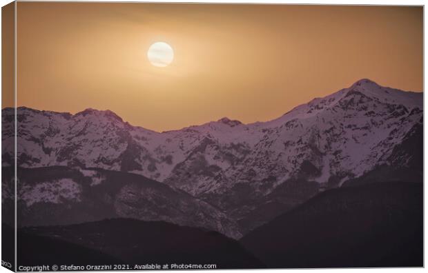Alpi Apuane mountains orange sunset. Canvas Print by Stefano Orazzini