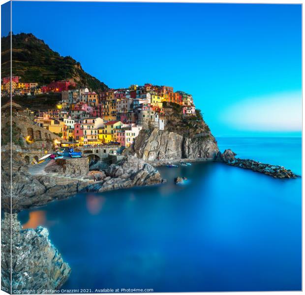 Manarola village, rocks and sea. Cinque Terre, Italy Canvas Print by Stefano Orazzini