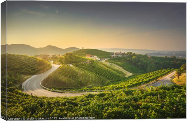 Vineyards and a road at sunrise. Prosecco Hills, Unesco Site. Canvas Print by Stefano Orazzini