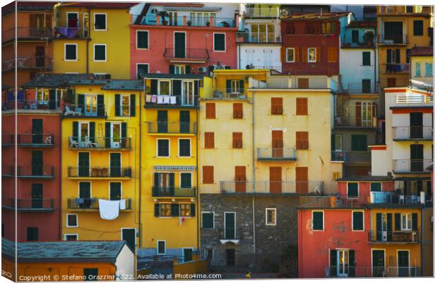 Manarola village, colorful pattern of houses. Cinque Terre Canvas Print by Stefano Orazzini
