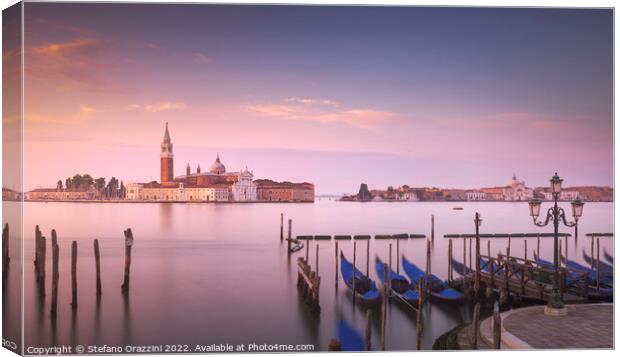 Venice, San Giorgio church and gondolas at sunrise. Italy Canvas Print by Stefano Orazzini