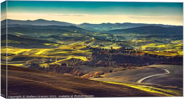 Volterra winter panorama, rolling hills and green fields at sunset Canvas Print by Stefano Orazzini