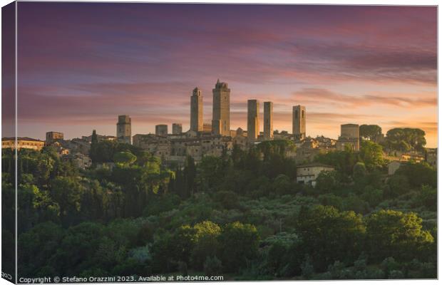 The towers of the village of San Gimignano at sunset. Tuscany, Italy Canvas Print by Stefano Orazzini