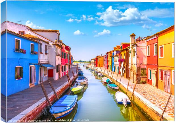 Burano island canal, colorful houses and boats. Venice lagoon Canvas Print by Stefano Orazzini
