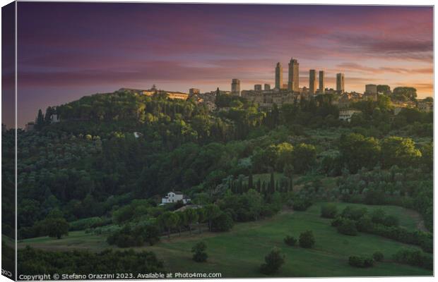 The towers of the village of San Gimignano at sunset. Italy Canvas Print by Stefano Orazzini