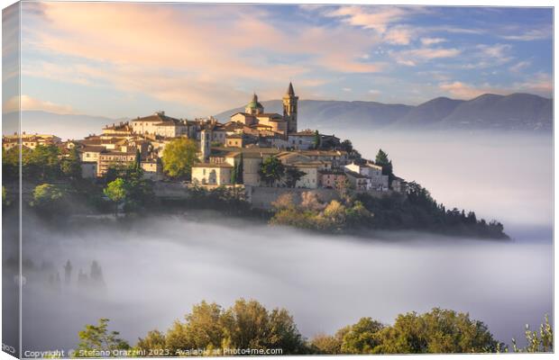 Trevi picturesque village in a foggy morning. Umbria, Italy Canvas Print by Stefano Orazzini