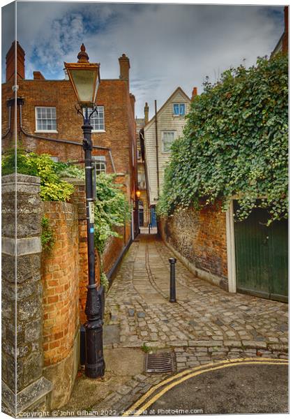 Gas lit footway Canvas Print by John Gilham