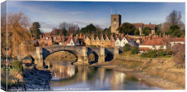 Aylesford Village on the river Medway in Kent at low tide  Canvas Print by John Gilham