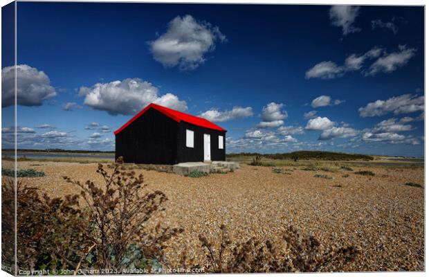 A Red Roofed Corrugated Iron Hut on the shingle at Canvas Print by John Gilham