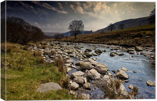 Rocky shallow stream in Wales UK Canvas Print by John Gilham