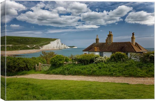 Seven Sisters cliffs and the Coastguards Cottages Sussex Canvas Print by John Gilham